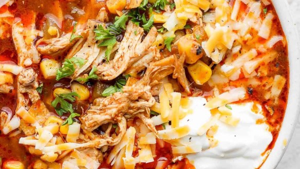 Close-up image of chicken enchilada soup.