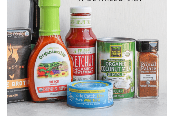 A jar of ketchup, french dressing, broth, canned tuna, coconut milk, and taco seasoning on the counter.